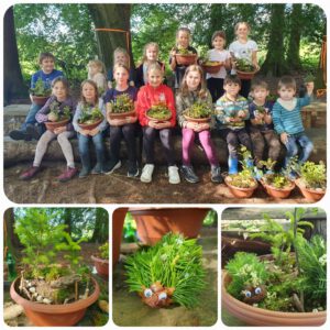 Die Kinder mit ihren Mini-Waldgärten